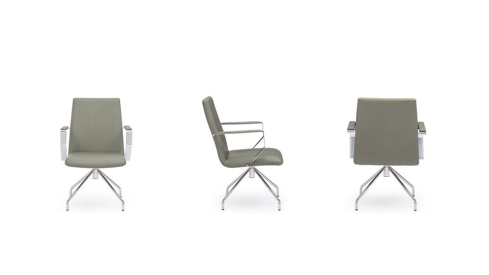 Кресло с низкой спинкой на опоре "паук"